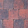 Kobbelstones getrommeld rood-zwart 10,5x10,5x7 cm. ~