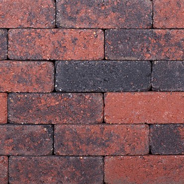 Dikformaat getrommeld rood-zwart 20x6,5x6,5 cm. ~