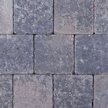 Kobbelstones getrommeld grijs-zwart 10,5x10,5x7 cm. ~